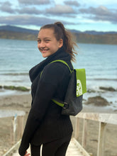 Load image into Gallery viewer, white koru on green · dark grey backpack