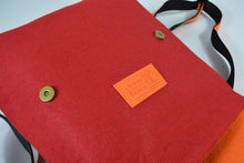 Load image into Gallery viewer, orange harakeke weave on red · red backpack